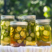 dill pickle jars on table cloth