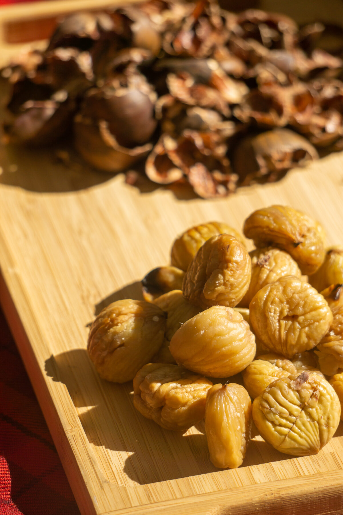 shelled chestnuts on cutting board