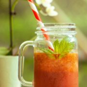watermelon mint cooler with straw and orchid
