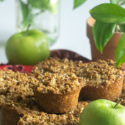 apple muffins on plate with green apples