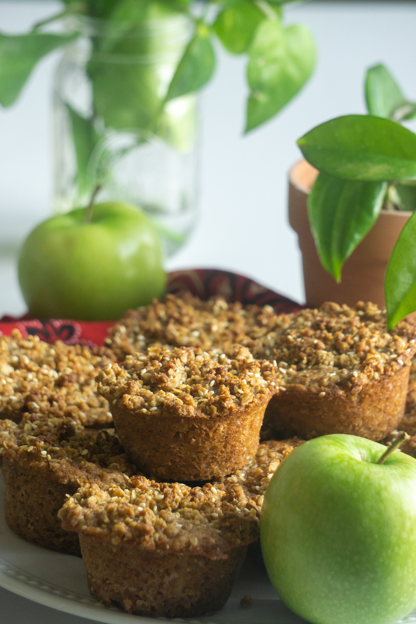 apple muffins on plate with green apples